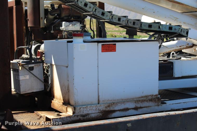 image for item K1916 1994 International 4700LP flatbed truck with environmental drill