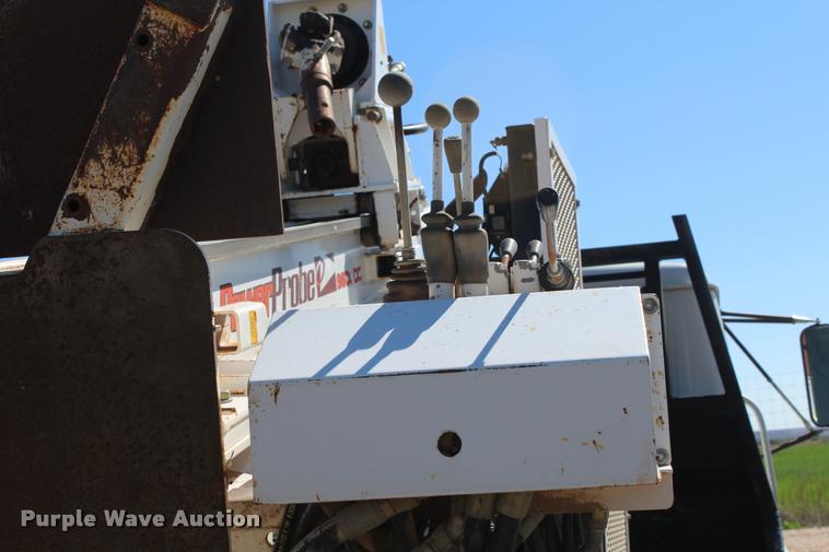 image for item K1916 1994 International 4700LP flatbed truck with environmental drill