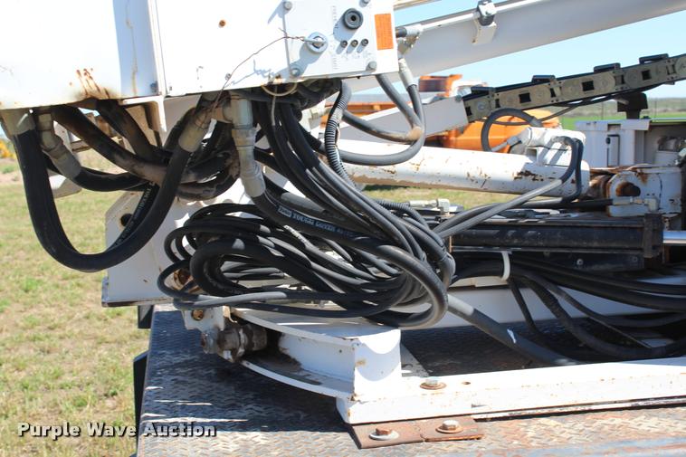 image for item K1916 1994 International 4700LP flatbed truck with environmental drill