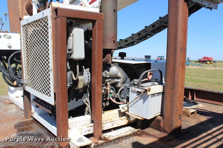 image for item K1916 1994 International 4700LP flatbed truck with environmental drill