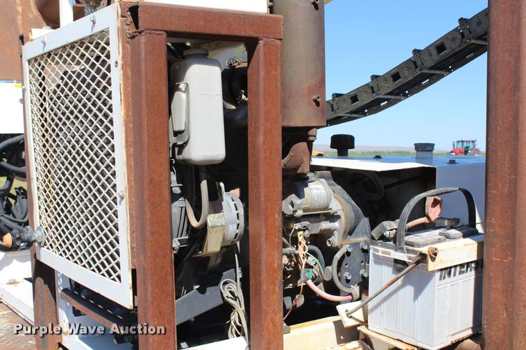 image for item K1916 1994 International 4700LP flatbed truck with environmental drill