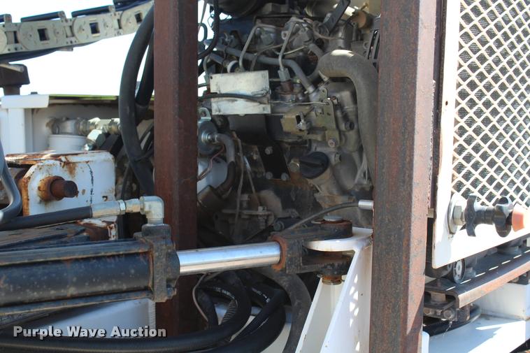 image for item K1916 1994 International 4700LP flatbed truck with environmental drill