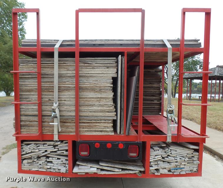 image for item L3284 1992 Ford LNT8000 flatbed truck with concrete forms