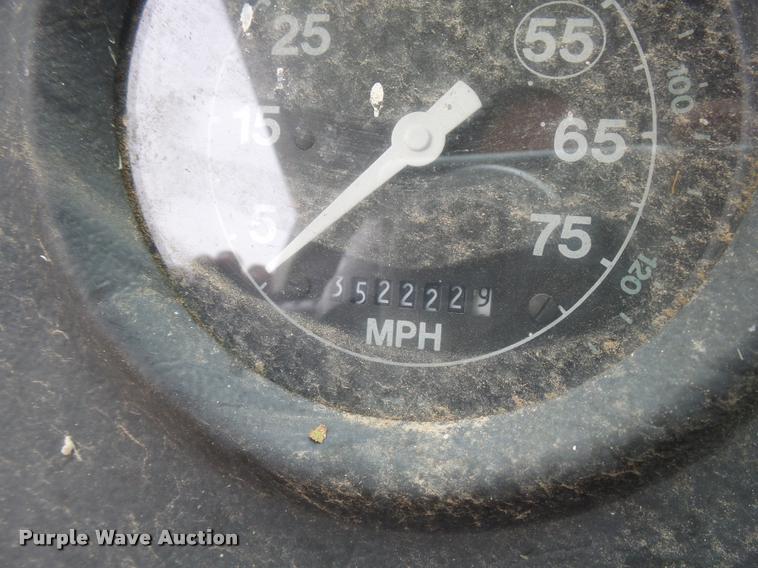 image for item L3284 1992 Ford LNT8000 flatbed truck with concrete forms