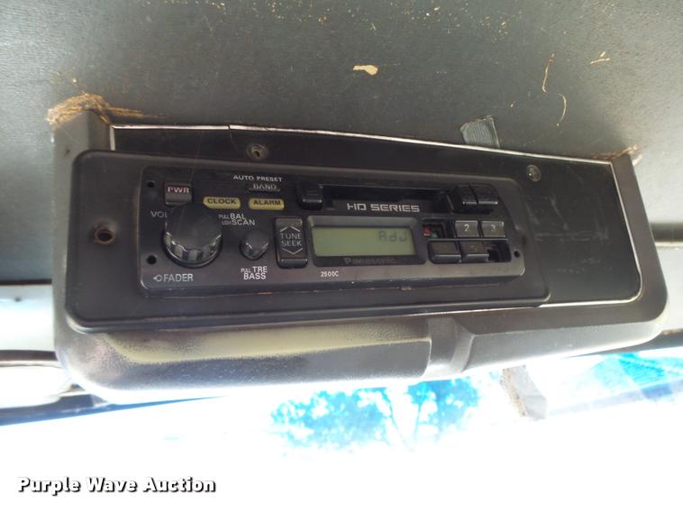 image for item L3284 1992 Ford LNT8000 flatbed truck with concrete forms