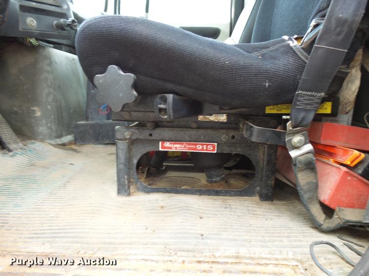 image for item L3284 1992 Ford LNT8000 flatbed truck with concrete forms