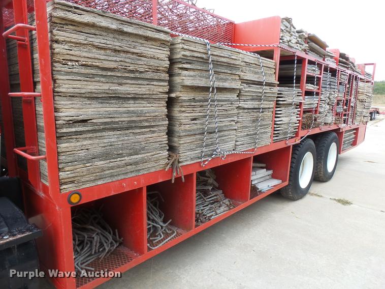 image for item L3284 1992 Ford LNT8000 flatbed truck with concrete forms