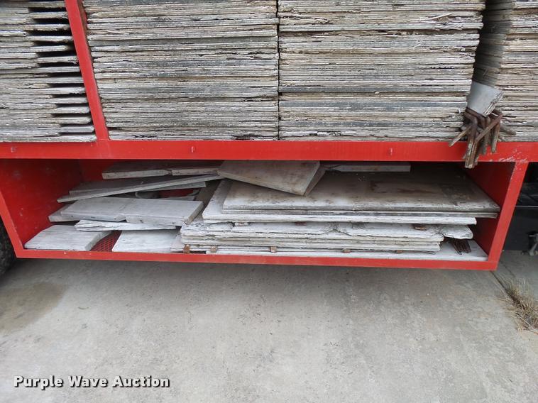 image for item L3284 1992 Ford LNT8000 flatbed truck with concrete forms