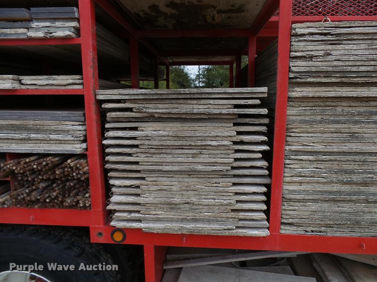 image for item L3284 1992 Ford LNT8000 flatbed truck with concrete forms