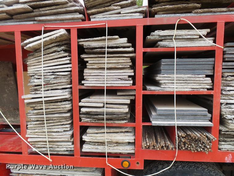 image for item L3284 1992 Ford LNT8000 flatbed truck with concrete forms