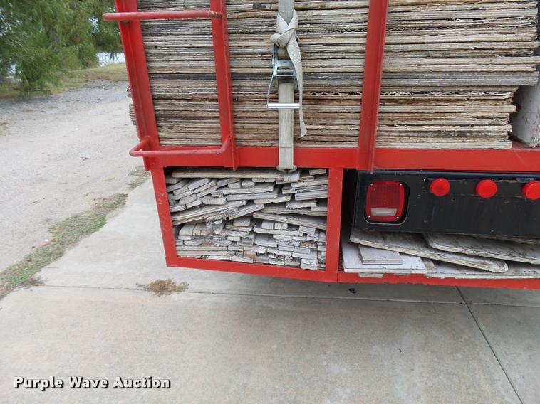 image for item L3284 1992 Ford LNT8000 flatbed truck with concrete forms