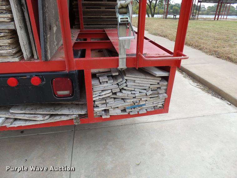 image for item L3284 1992 Ford LNT8000 flatbed truck with concrete forms