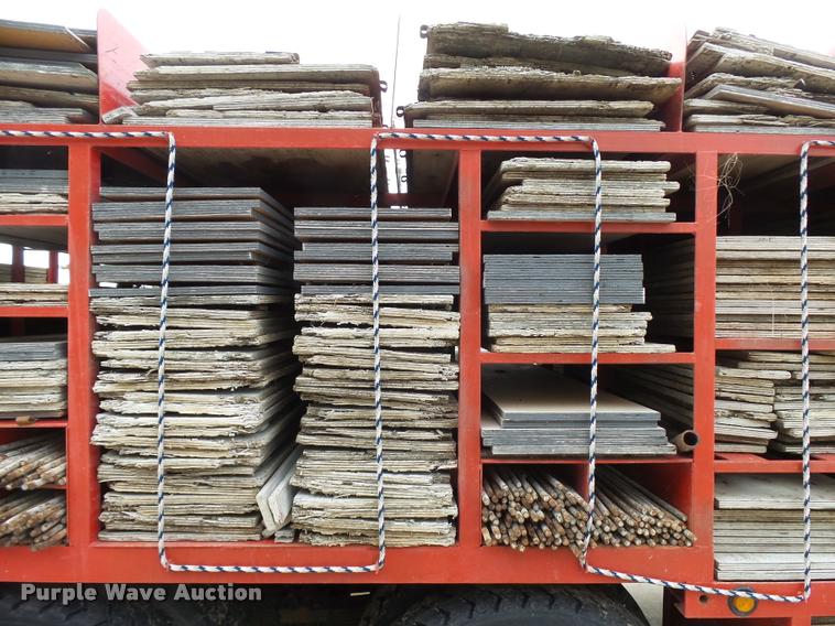 image for item L3284 1992 Ford LNT8000 flatbed truck with concrete forms