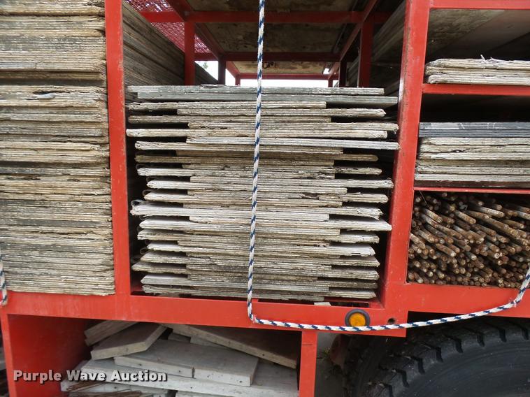 image for item L3284 1992 Ford LNT8000 flatbed truck with concrete forms