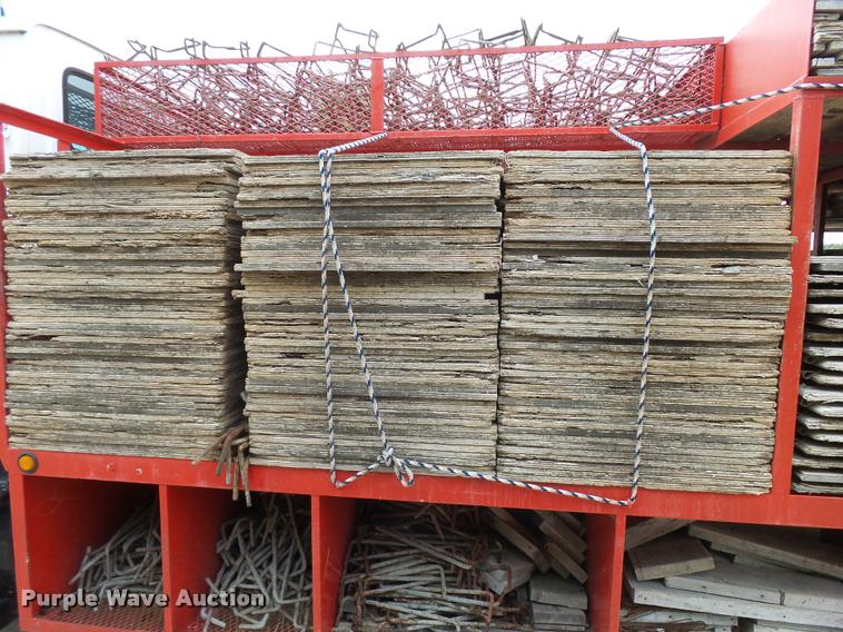 image for item L3284 1992 Ford LNT8000 flatbed truck with concrete forms