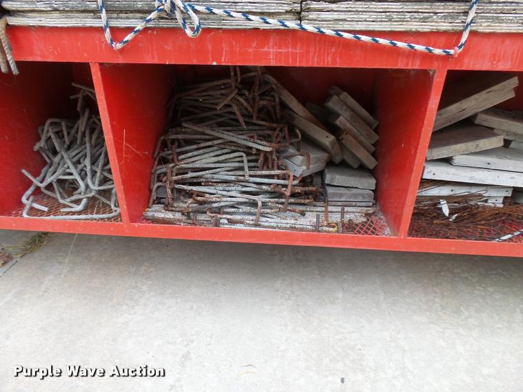 image for item L3284 1992 Ford LNT8000 flatbed truck with concrete forms