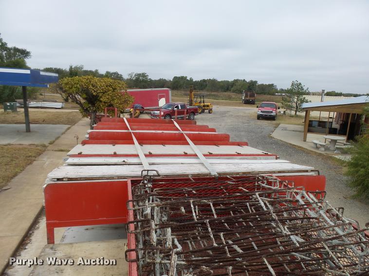 image for item L3284 1992 Ford LNT8000 flatbed truck with concrete forms