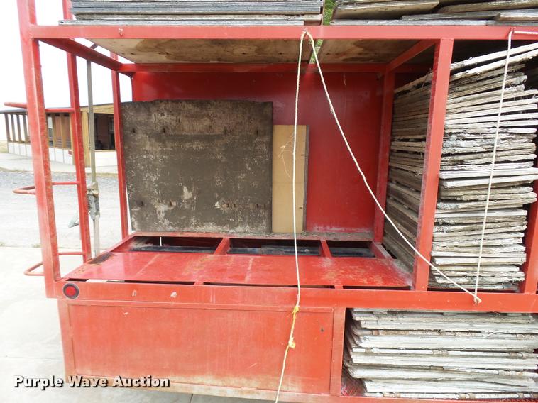 image for item L3284 1992 Ford LNT8000 flatbed truck with concrete forms