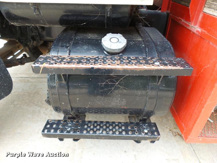 image for item L3284 1992 Ford LNT8000 flatbed truck with concrete forms