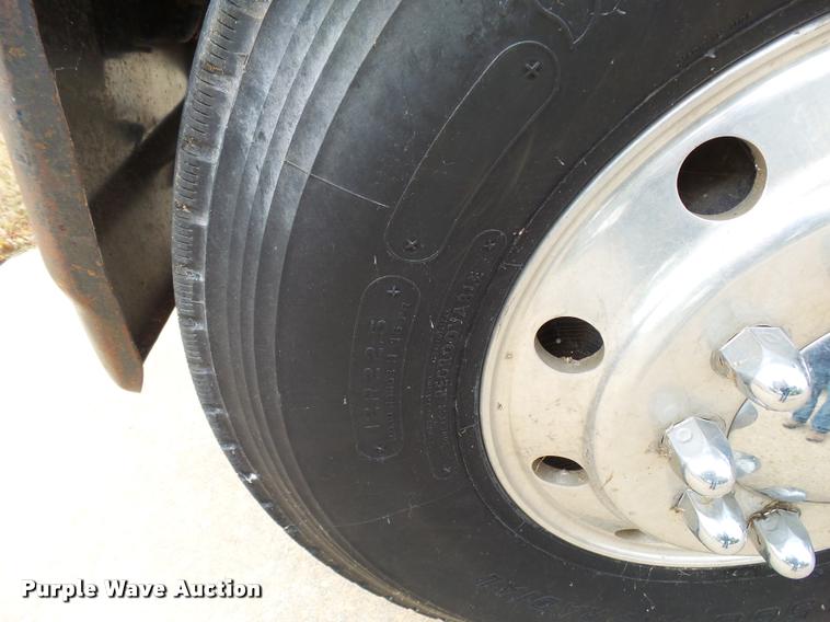 image for item L3284 1992 Ford LNT8000 flatbed truck with concrete forms