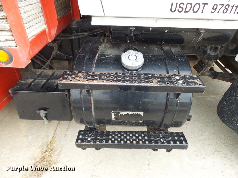 image for item L3284 1992 Ford LNT8000 flatbed truck with concrete forms