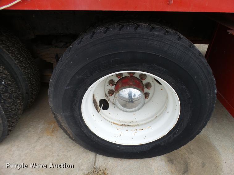 image for item L3284 1992 Ford LNT8000 flatbed truck with concrete forms