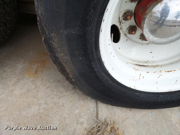 image for item L3284 1992 Ford LNT8000 flatbed truck with concrete forms