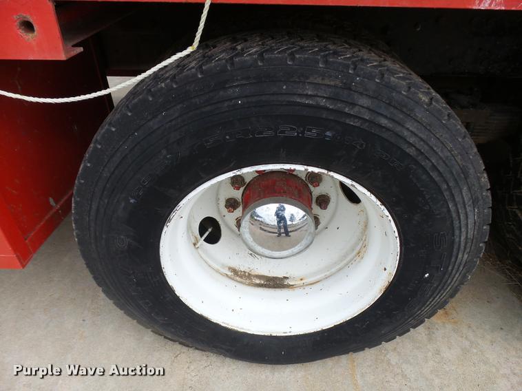 image for item L3284 1992 Ford LNT8000 flatbed truck with concrete forms