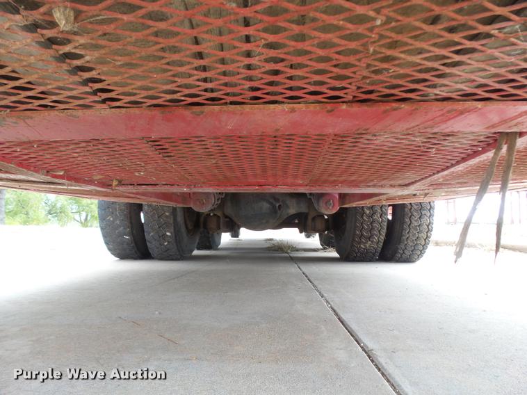 image for item L3284 1992 Ford LNT8000 flatbed truck with concrete forms