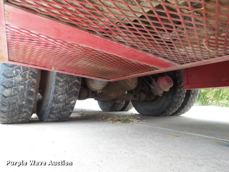 image for item L3284 1992 Ford LNT8000 flatbed truck with concrete forms