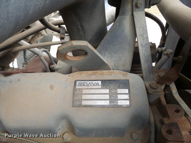 image for item L3284 1992 Ford LNT8000 flatbed truck with concrete forms