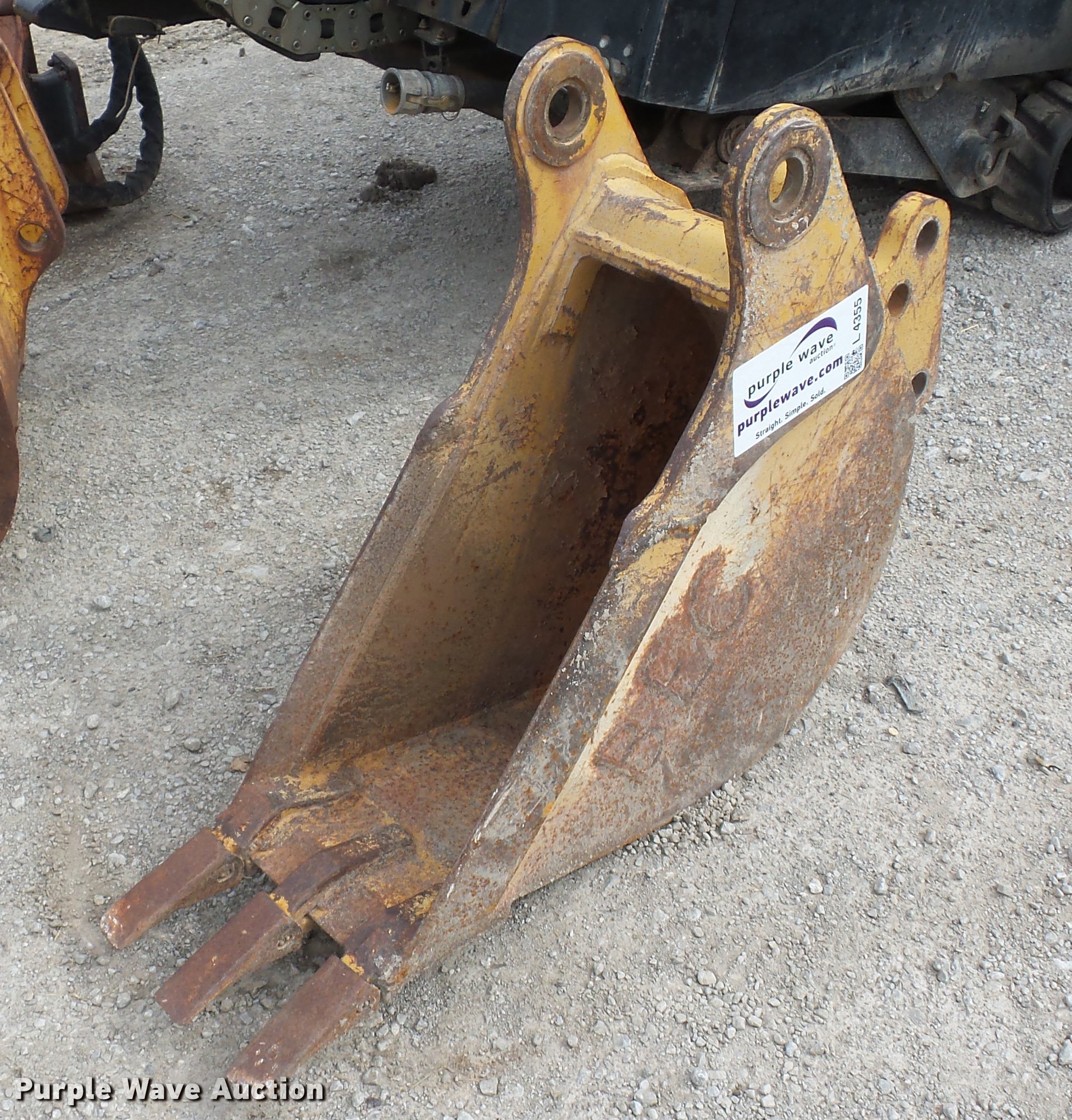 Case 580 backhoe bucket in Independence, MO Item L4355 sold Purple Wave