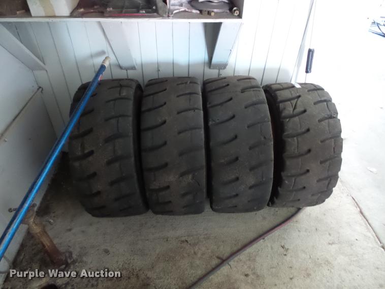 image for item AX9077 (4) skid steer tires and wheels