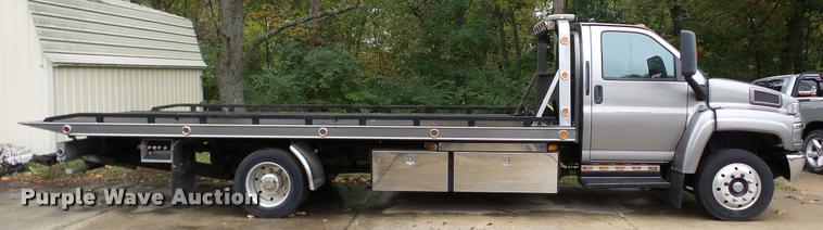 image for item DA8911 2009 GMC C5500 rollback truck
