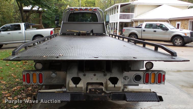 image for item DA8911 2009 GMC C5500 rollback truck