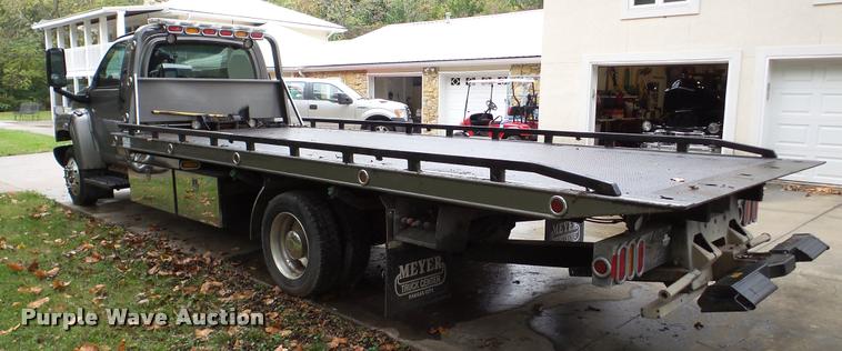 image for item DA8911 2009 GMC C5500 rollback truck