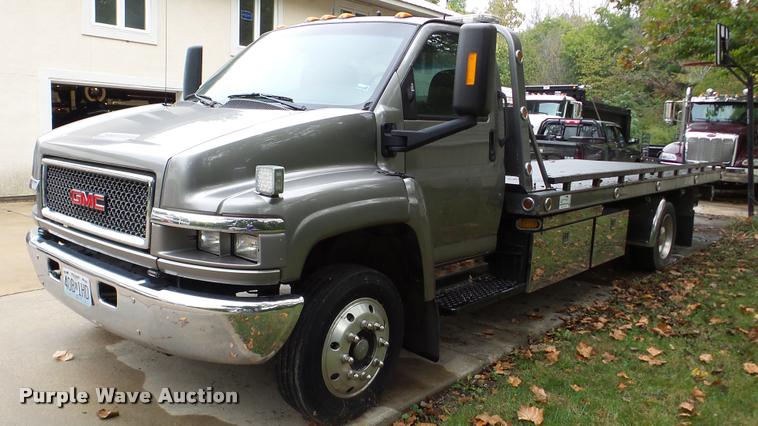 image for item DA8911 2009 GMC C5500 rollback truck