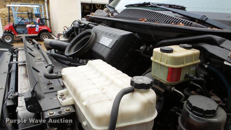 image for item DA8911 2009 GMC C5500 rollback truck