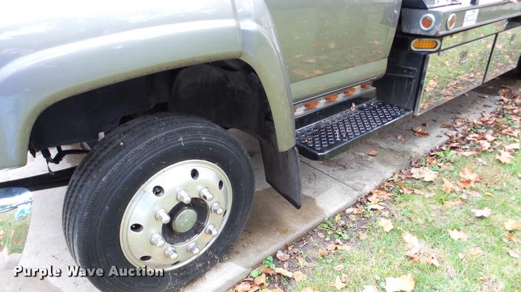 image for item DA8911 2009 GMC C5500 rollback truck