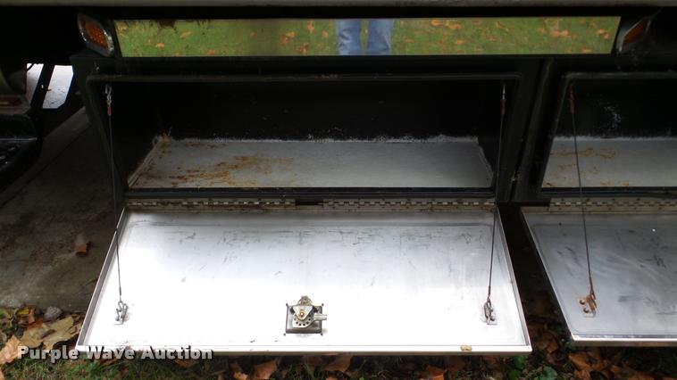 image for item DA8911 2009 GMC C5500 rollback truck