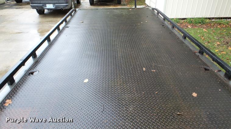 image for item DA8911 2009 GMC C5500 rollback truck