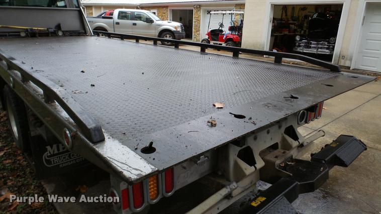 image for item DA8911 2009 GMC C5500 rollback truck