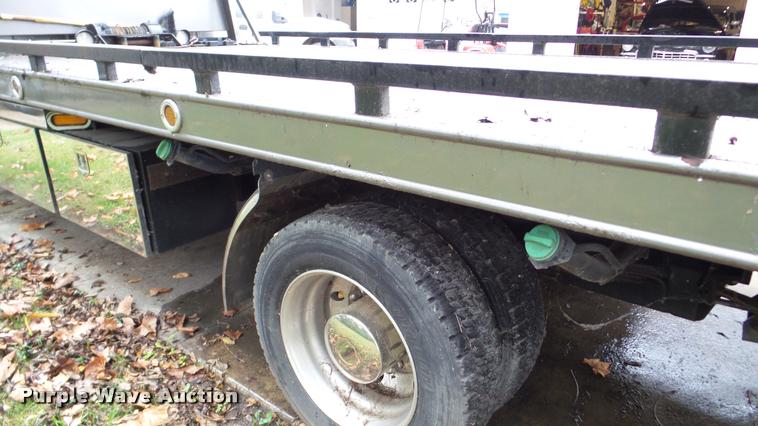 image for item DA8911 2009 GMC C5500 rollback truck