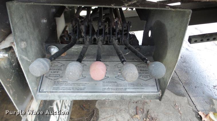 image for item DA8911 2009 GMC C5500 rollback truck