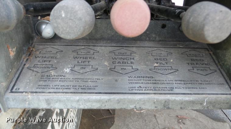 image for item DA8911 2009 GMC C5500 rollback truck