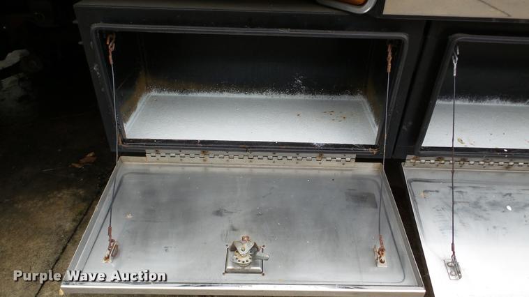 image for item DA8911 2009 GMC C5500 rollback truck