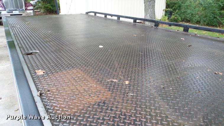 image for item DA8911 2009 GMC C5500 rollback truck