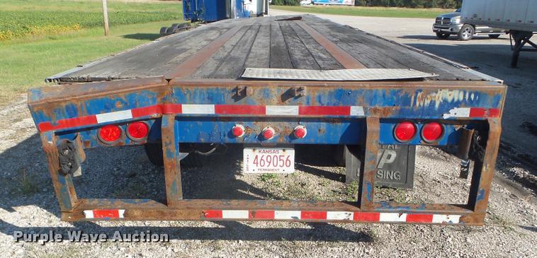 image for item L1692 1999 Nu Van flatbed trailer