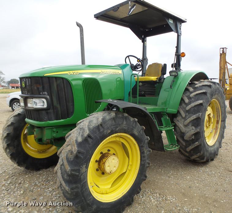 image for item K5596 2003 John Deere 6420 MFWD tractor
