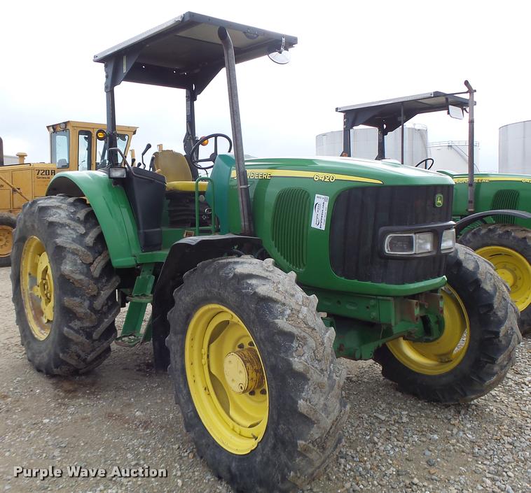 image for item K5596 2003 John Deere 6420 MFWD tractor